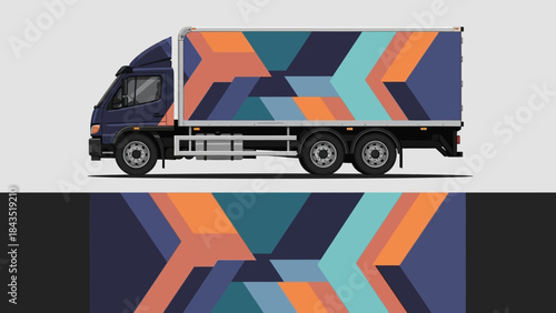 Colorful geometric patterned cargo truck with abstract shapes and bold angular design.