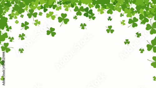 A festive St. Patrick's Day background with falling green shamrocks and clover leaves on a white backdrop.