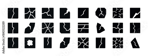 Set of various crack patterns on black background illustrating d
