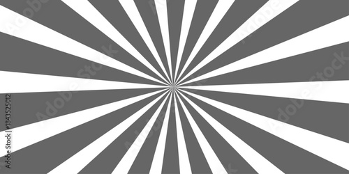 A vintage grunge sunburst vector illustration featuring black and white rays in an abstract retro pattern with a textured paper backdrop and light star beam design