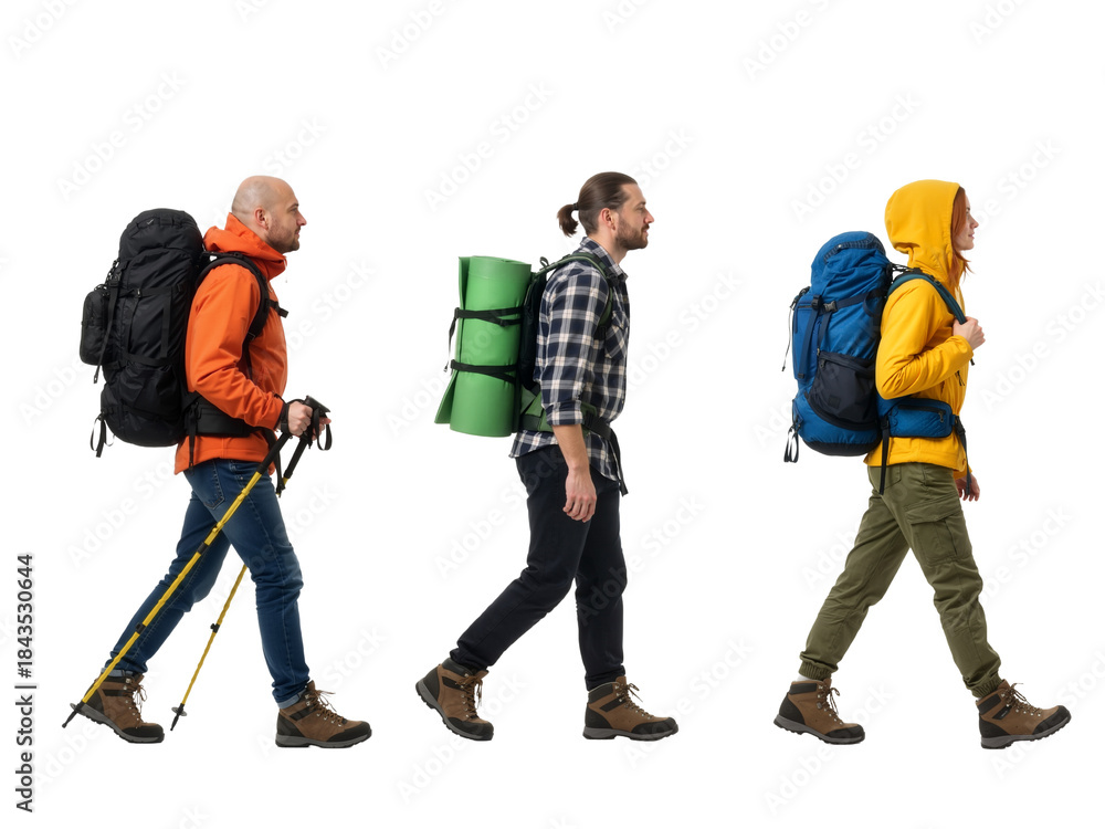Fototapeta premium Three Hikers on a Trail – Equipped for Adventure in Nature’s Journey
