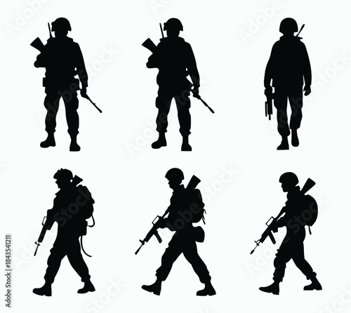 Silhouettes of soldiers standing and walking with rifles

