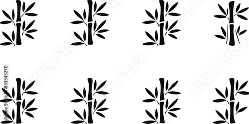 Elegant black bamboo stalks and leaves composition silhouetted against a clean white background