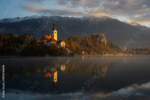 Reflection Sunrise at lake Bled during autumn 