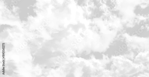 A gray sky with clouds. Gray sky with whimsical curly cloud, Dark background before Rainstorm.
 copy space. 