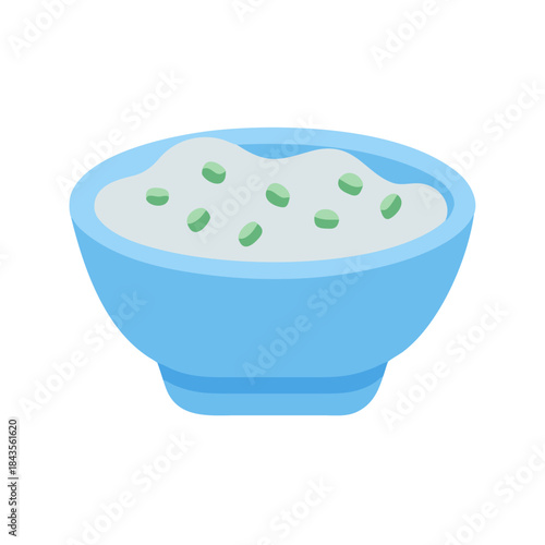 Cereal bowl with green pieces in light blue bowl