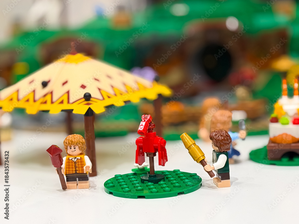 Fototapeta premium Colorful lego scene with characters and dinosaur