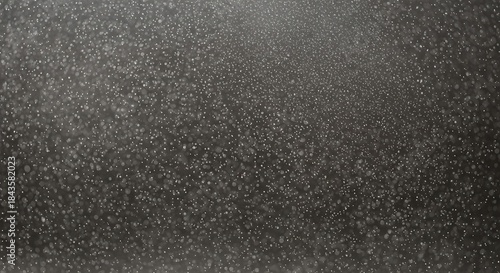 Swirling cosmic dust particles against a vast expanse of deep blackness