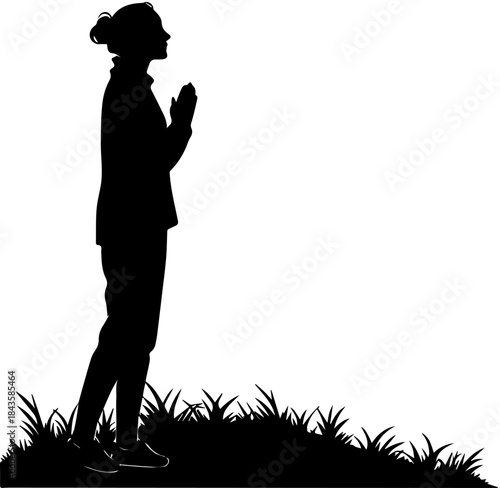 Contemplative Silhouette of Person in Prayer Pose