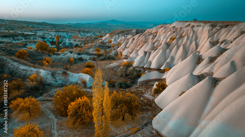 Cappadocia rock structures in Turkey during autumn, highlighting warm seasonal tones, unique shapes, and peaceful natural scenery.