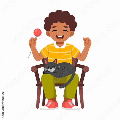 A joyful child in a striped shirt happily holds a lollipop while sitting on a chair with a sleeping cat, illustrating the joy of companionship and childhood innocence.