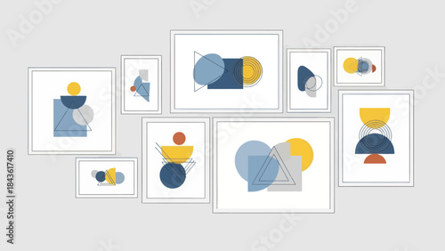 Collection of modern abstract geometric art prints in white frames, contemporary wall decor.
