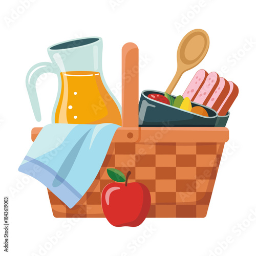 A charming picnic basket filled with delicious snacks, refreshing juice, and a cozy blanket suggests a perfect outdoor gathering, ideal for enjoying nature and good company.