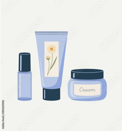 An aesthetically pleasing arrangement of skincare products in soft blue tones, showcasing their elegant floral designs, representing beauty, self-care, and modern cosmetic luxury.