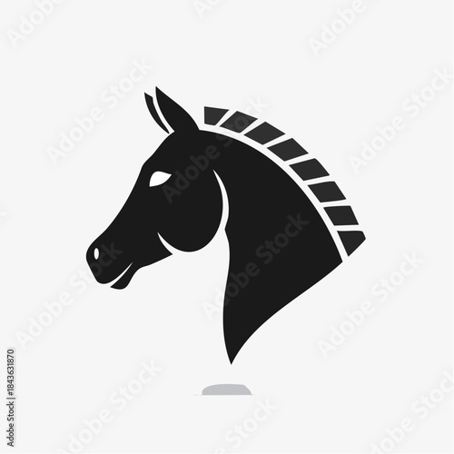 Elegant black horse head icon, stylized with a distinctive mane, capturing strength, freedom, and dynamic motion. A minimalist graphic for modern branding and equestrian themes