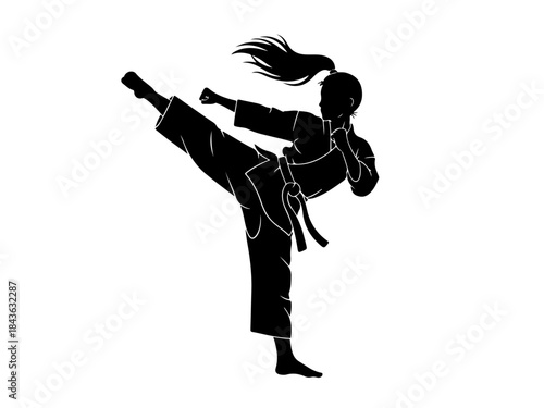 Black silhouette of a female martial artist performing a high kick in a gi, demonstrating strength and agility.