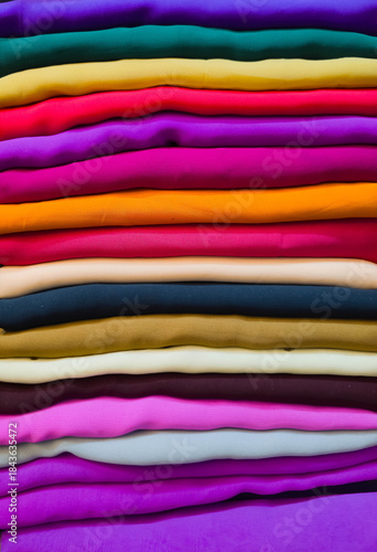 Multi Coloured Catalogue of Clothing Materials and Designs background