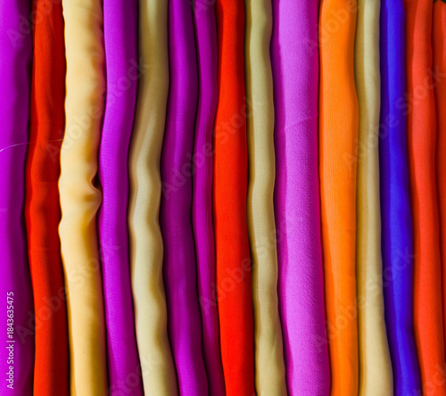 Multi Coloured Catalogue of Clothing Materials and Designs background