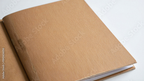 Konstfotografi Brown cardboard notebook on white background