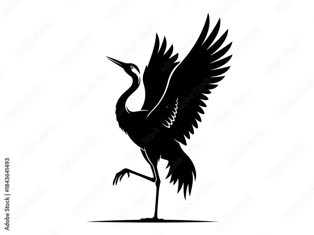 Fototapeta premium Black silhouette of a graceful crane bird standing on one leg with its wings elegantly spread against a white background.