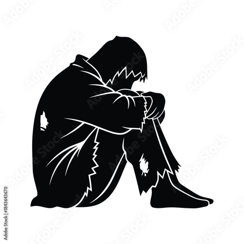 Silhouette of a person hunched over with head down representing despair and isolation