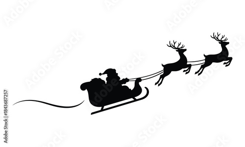 Silhouette of santa claus and reindeer flying through the night sky
