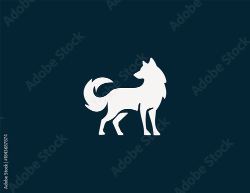 Elegant wolf logo standing in side profile, a minimalist graphic design against a dark backdrop.