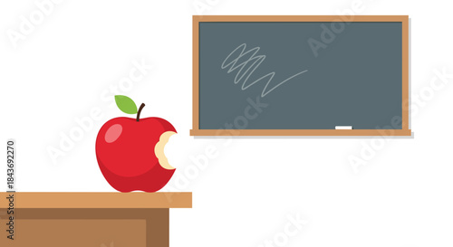 Classic classroom scene with a red apple that has a bite taken out of it sitting on a teacher's desk in front of a chalkboard.