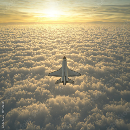 A white, shuttle-like spacecraft flies high above a vast golden cloudscape during a beautiful sunrise or sunset, illuminated by warm light