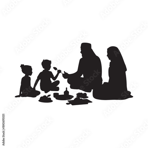 A silhouetted family shares a meal together enjoying a peaceful moment