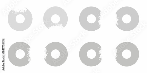 Abstract gray circles arranged in a grid showing varied textures and forms