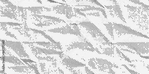 Abstract grayscale texture resembling a dense patterned and speckled surface