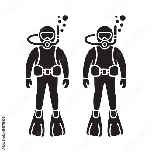 Two scuba divers in silhouette equipped for underwater exploration