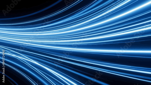Abstract blue light trails on black background representing speed and energy