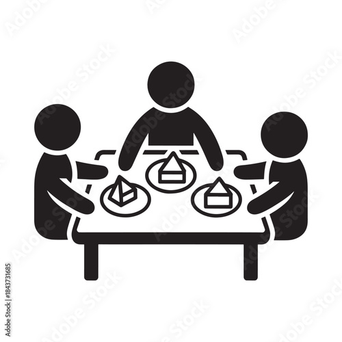 People seated around a table engaging with geometric shapes