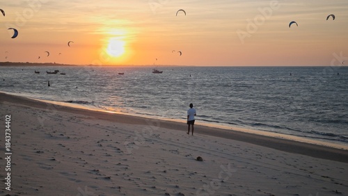 Walking on the Barra Grande beach in Golden hour.