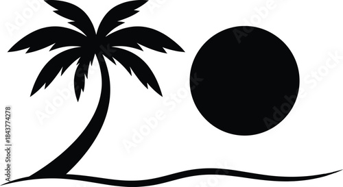 Silhouette of a palm tree and sun on a beach