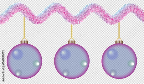 Colorful christmas decorations with pink tinsel and three purple ornaments
