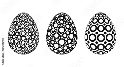 Geometric eggs with bold black and white circular patterns