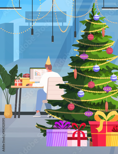 A young businessman in a festive party hat works in a modern office. Around him is a cheerful New Year atmosphere with a decorated Christmas tree, wrapped gifts on his desk. Vector Not AI generated