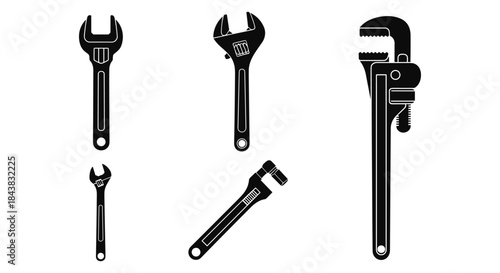 Silhouette set of adjustable wrenches and pipe tools on white background