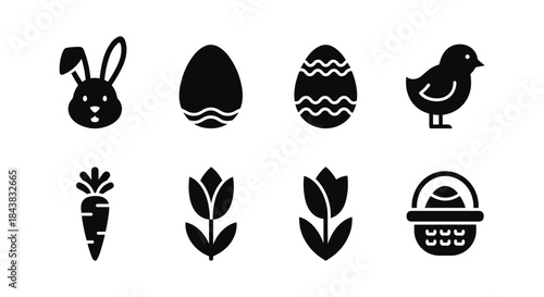 Easter icons set: bunny, eggs, chick, carrot, tulip, basket in silhouette style