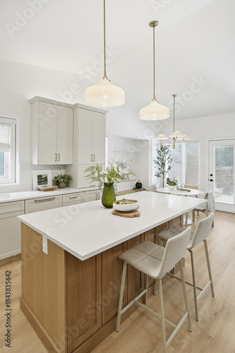 Kitchen with a white counter and wooden cabinets