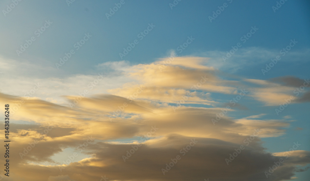 Obraz premium Sunset in the clouds. Sky background.