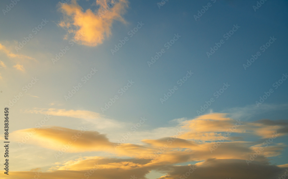 Obraz premium Sunset in the clouds. Sky background.