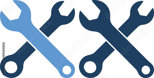 Four blue wrench icons crossed over each other onblue background in different shades
