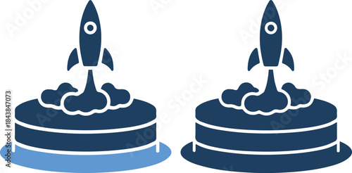 Two cakes with rockets on top