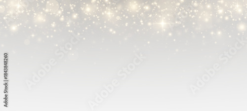 Glistering particles and sparkling starlight across a bright festive background. Twinkling lights, golden highlights, and magical bokeh for a holiday atmosphere.