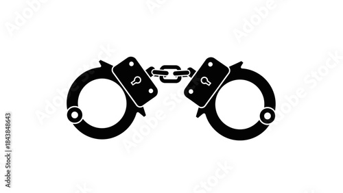 a stark black and white depiction of standard police handcuffs symbolizing restraint law enforcement and the criminal justice system presented on a plain background
