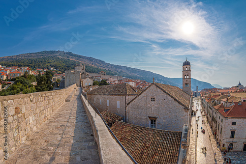 Old Town near Pile Gate, with Stradun Street, the main pedestrian street paved with limestone from the 13th century. View from the medieval city walls, Dubrovnik, Croatia